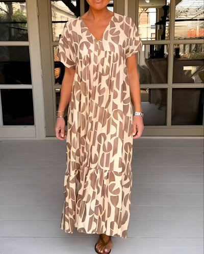 Colette | Flytende kjole med V-hals.